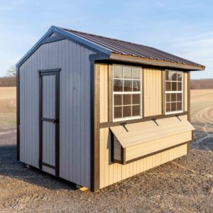 a chicken coop in a field